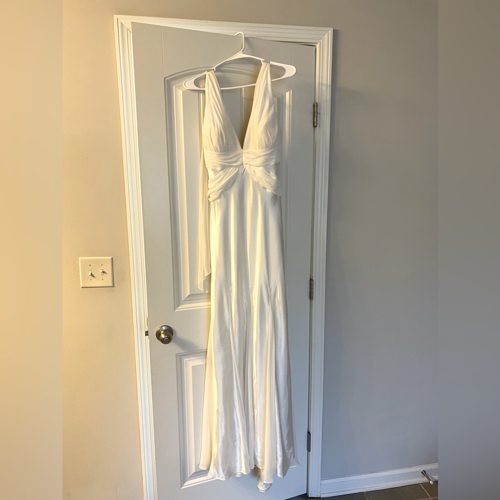 Beautiful backless gown. Really good condition, only worn once.